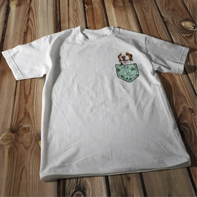 Shirt with dog in the pocket.